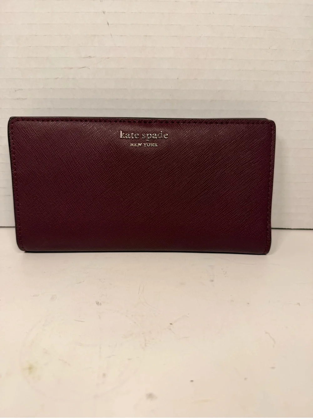 Kate Spade Cameron Large Slim Bifold Wallet in Burgundy Saffiano Leather
